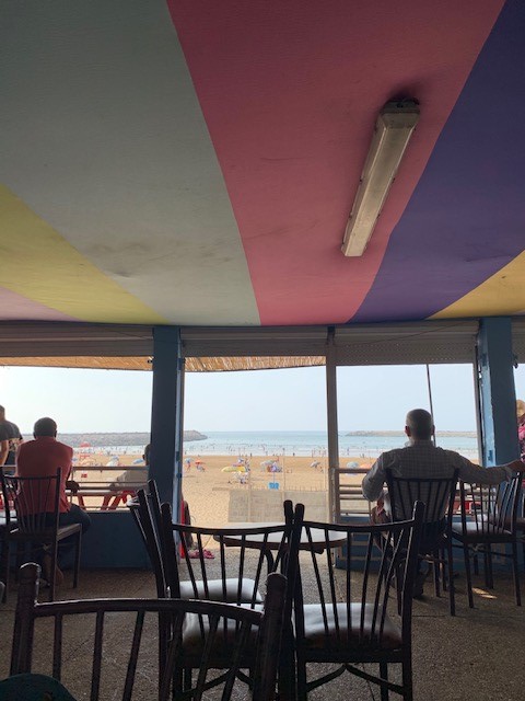 The surf shop is a great place to hang out and wait for waves to pick up. Photo credit: Finley, 2019