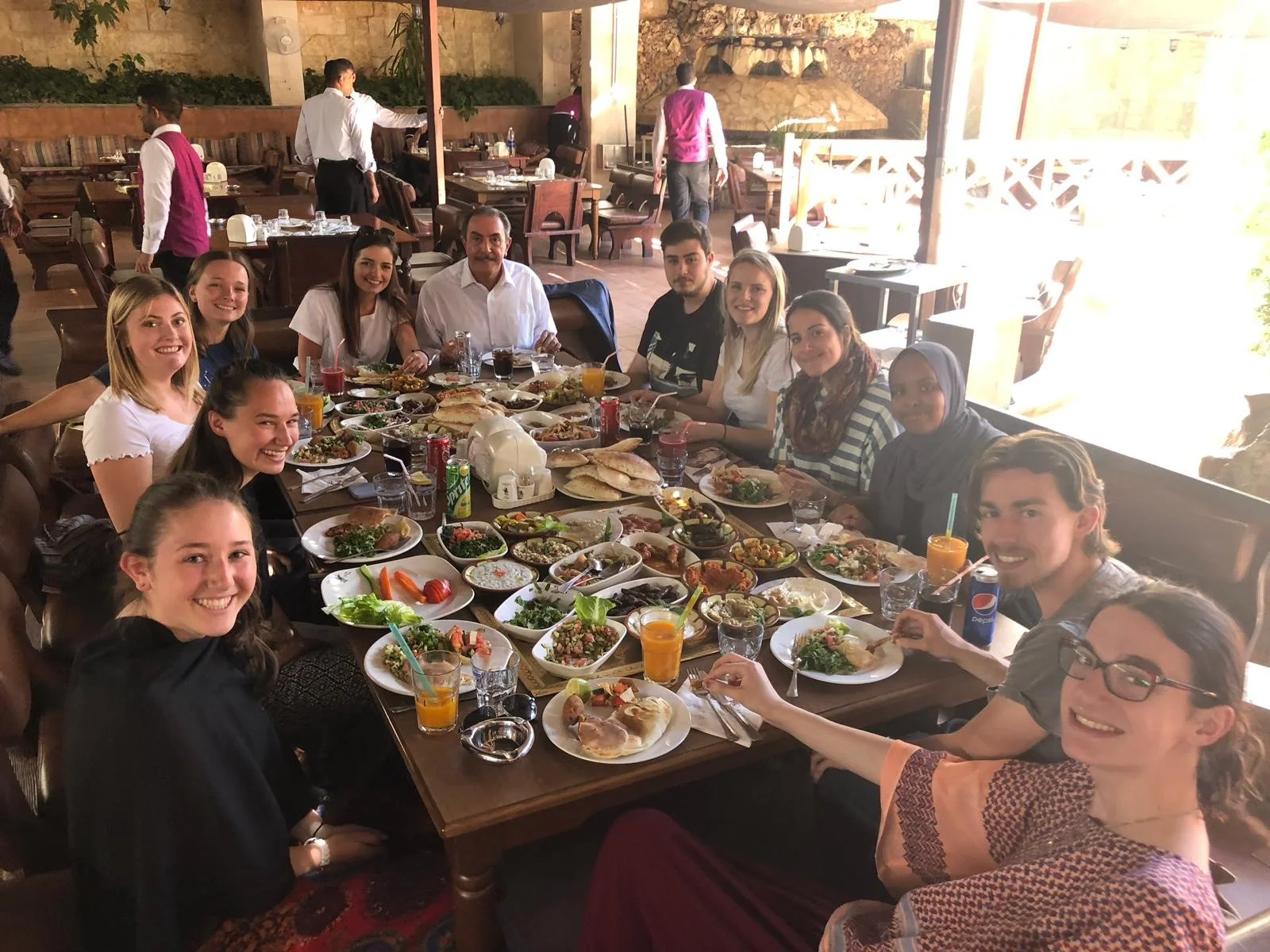 After our Conflict & the Struggle for Peace program portion of classes in Amman, our professor Dr. Omar Rifai took us all out for a traditional Jordanian meal. Photo credit: Russo, 2019