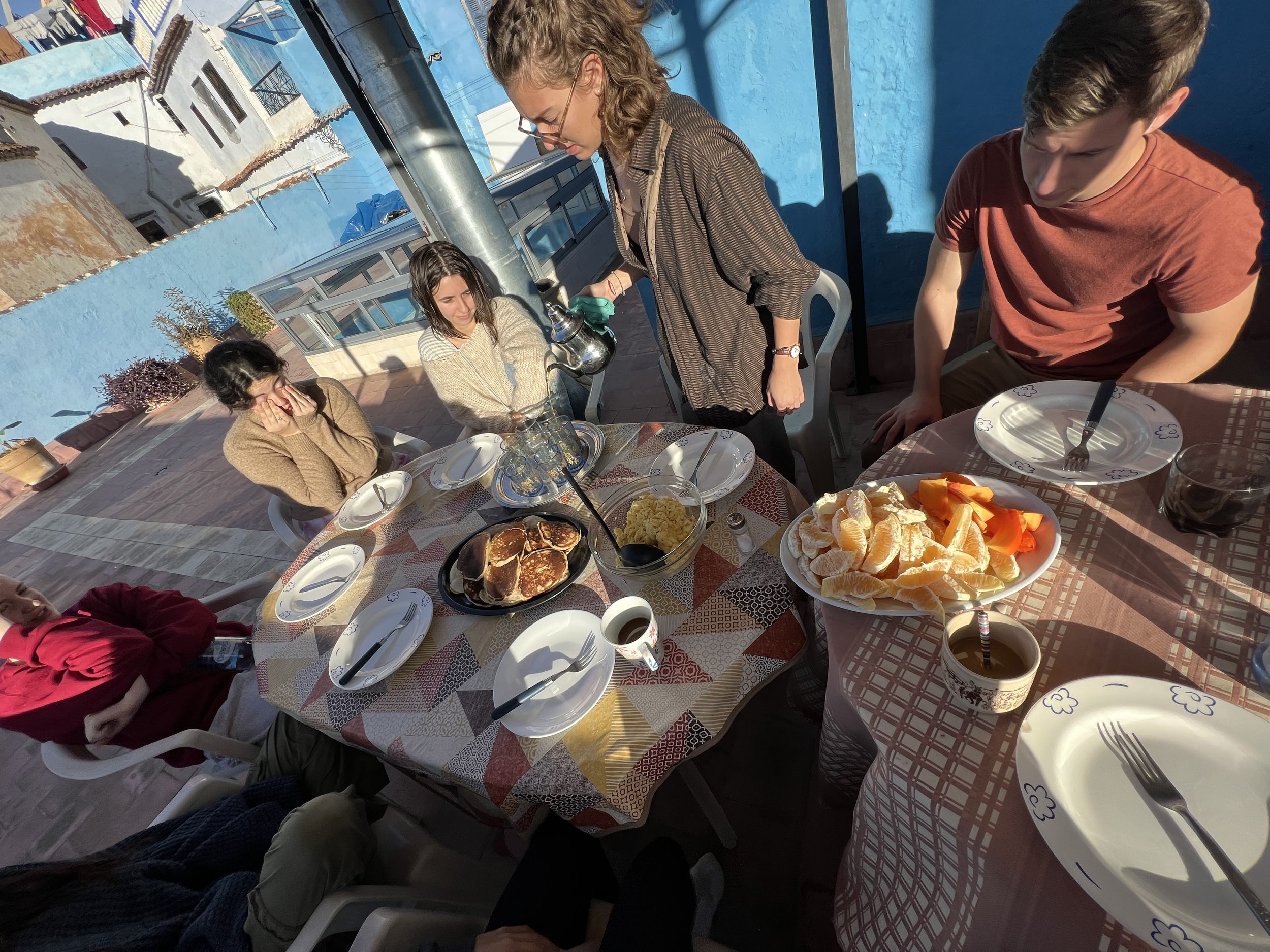   There’s nothing cozier than a pancake breakfast with the lovely humans from the Amideast family. Of course, now that we’re Moroccan we can’t have any meal without our traditional mint tea.   Photo credit: Coffman, 2023. 