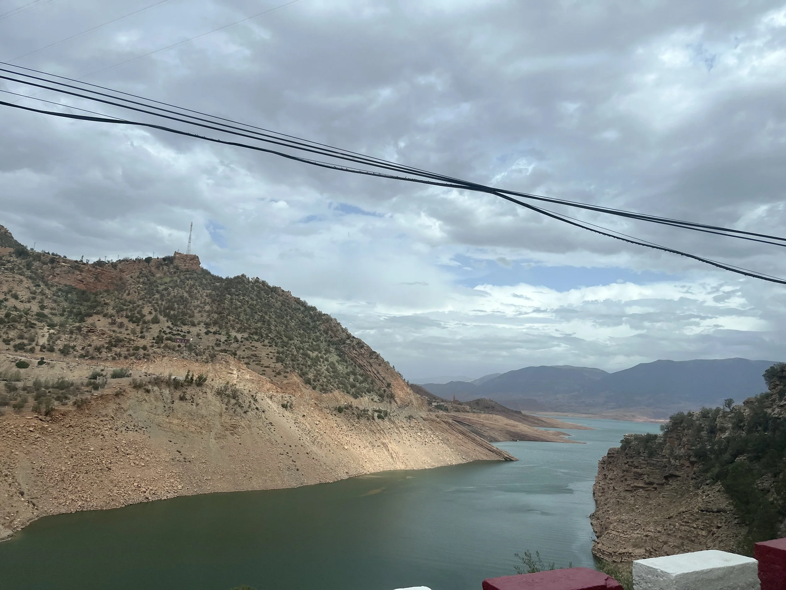   The valley below the dam on the way to Zaouiat Ahansal. This valley exposed the extent of the drought in Morocco. The dam was massive compared to the water-levels flowing by, however the reservoir in the mountains made for a gorgeous photo.   