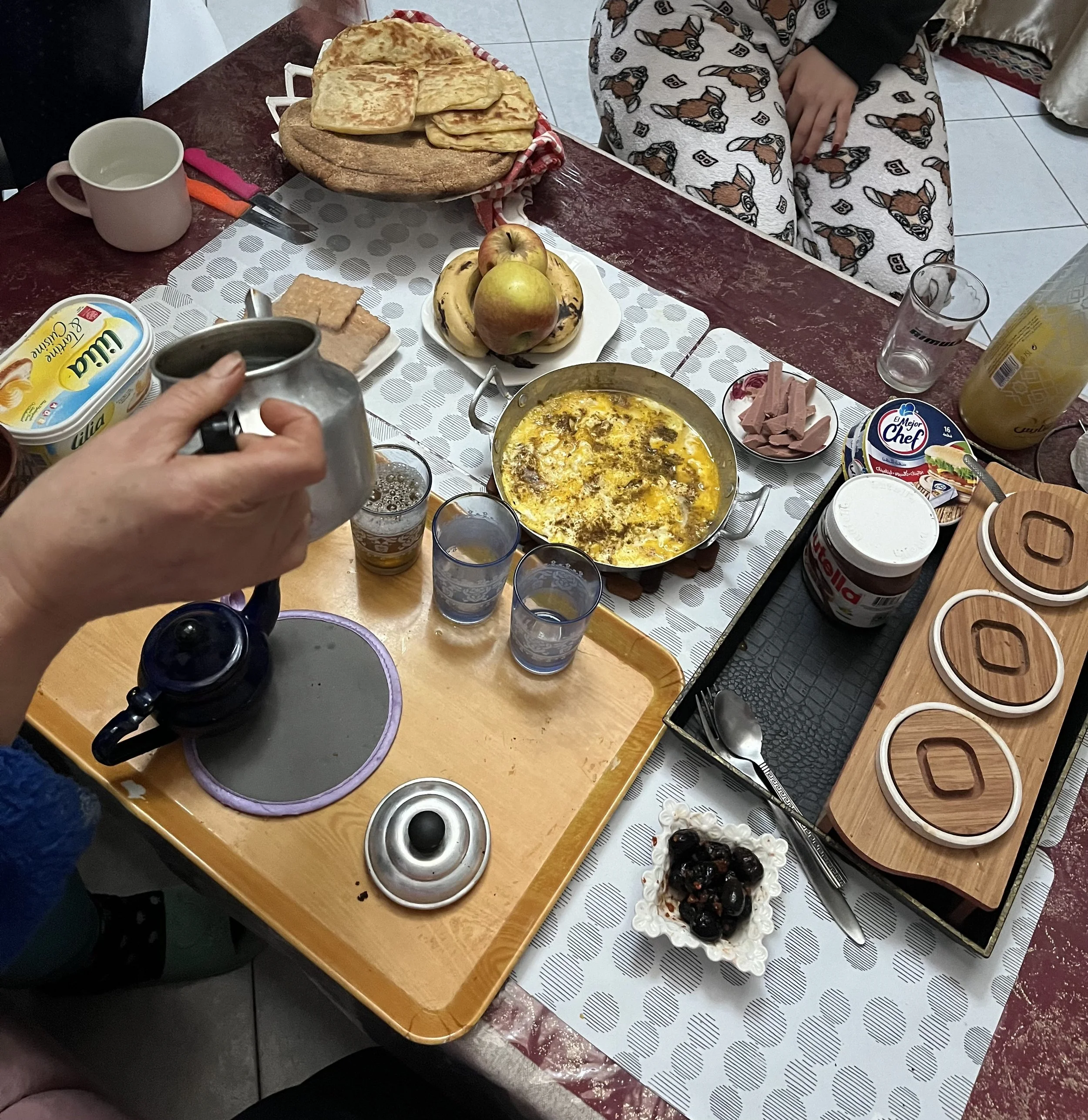 "around the table: a poem" by Mallory Slucher