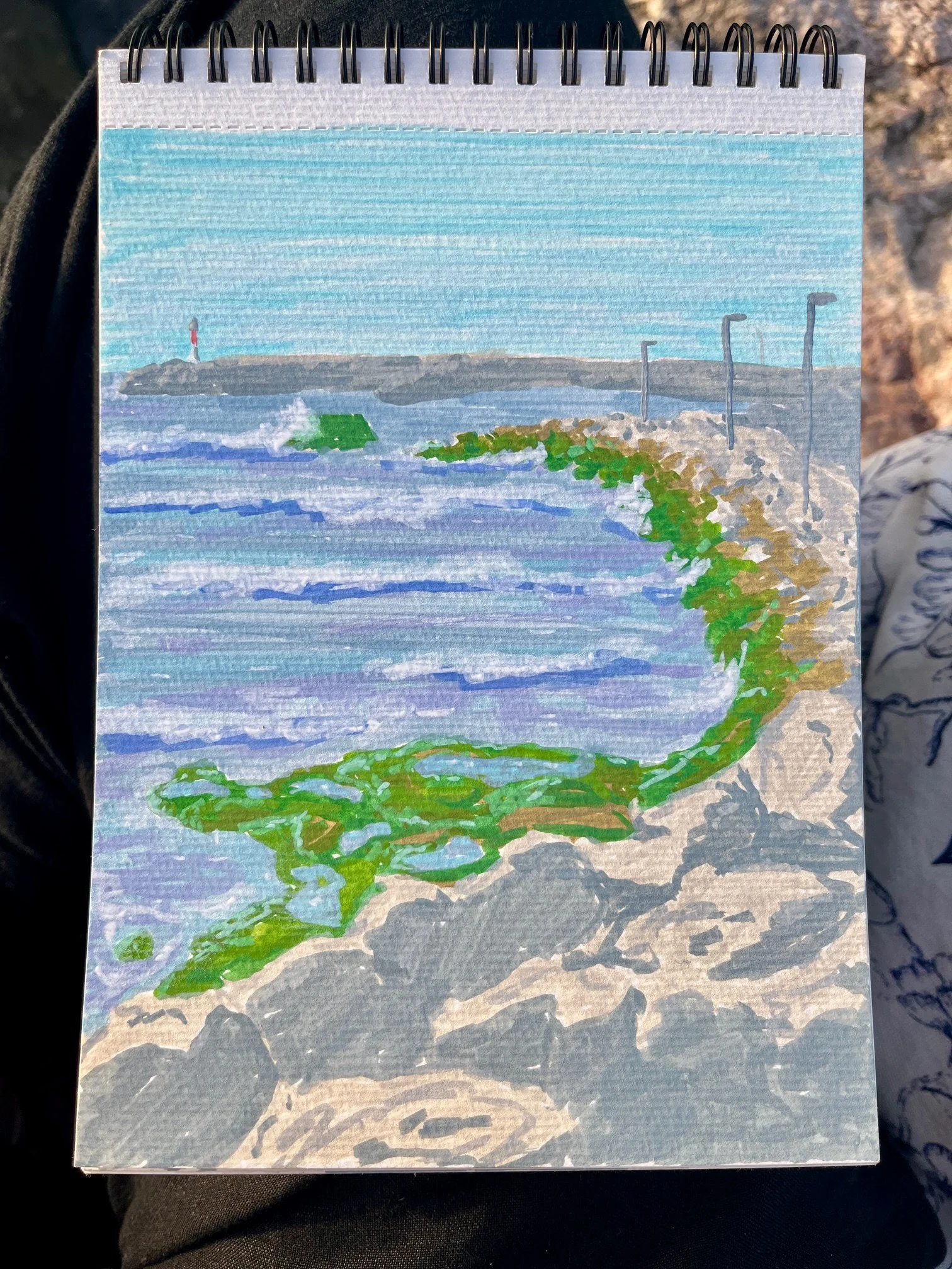 A painting of the shoreline in Rabat with the water hitting the rocky coast.