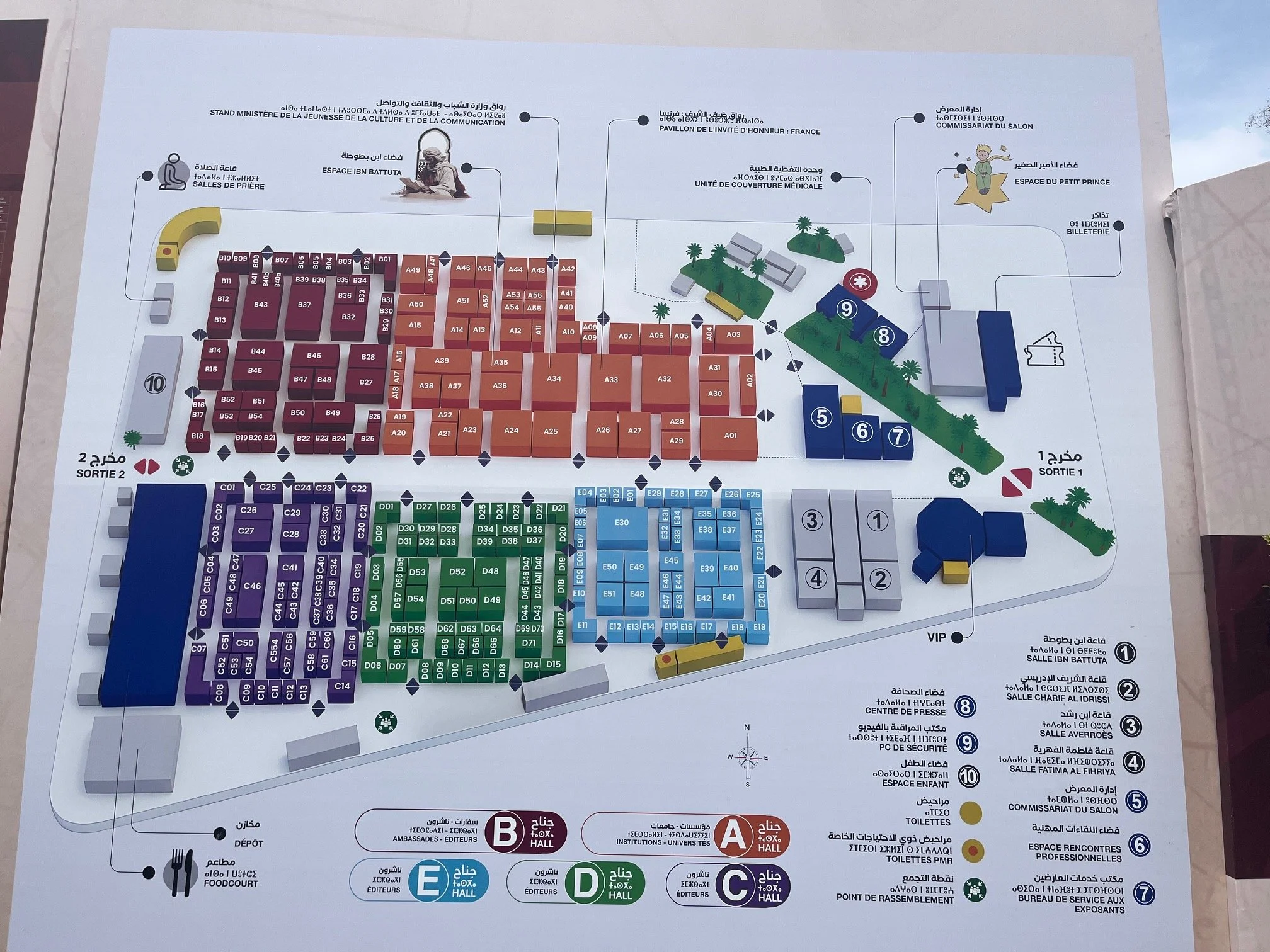 A map in French, Arabic, and Tamazight outlines the book fair