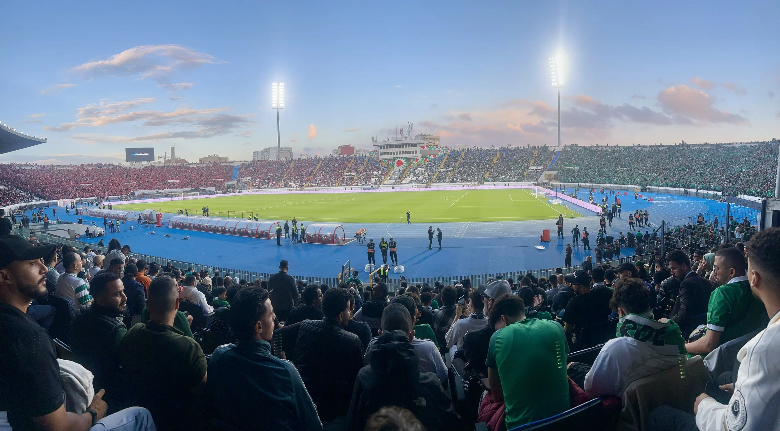 A wide-angle shot of the football pitch inside the stadium