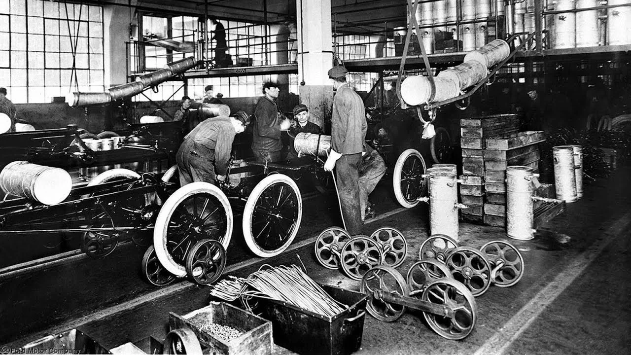 Ford Motor Company Model T Assembly Line, 1913. Within a year, further improvements reduced the time required to build a car to 93 man-minutes, its cost fell to less than $400, and the affordable Model T changed the landscape of America.