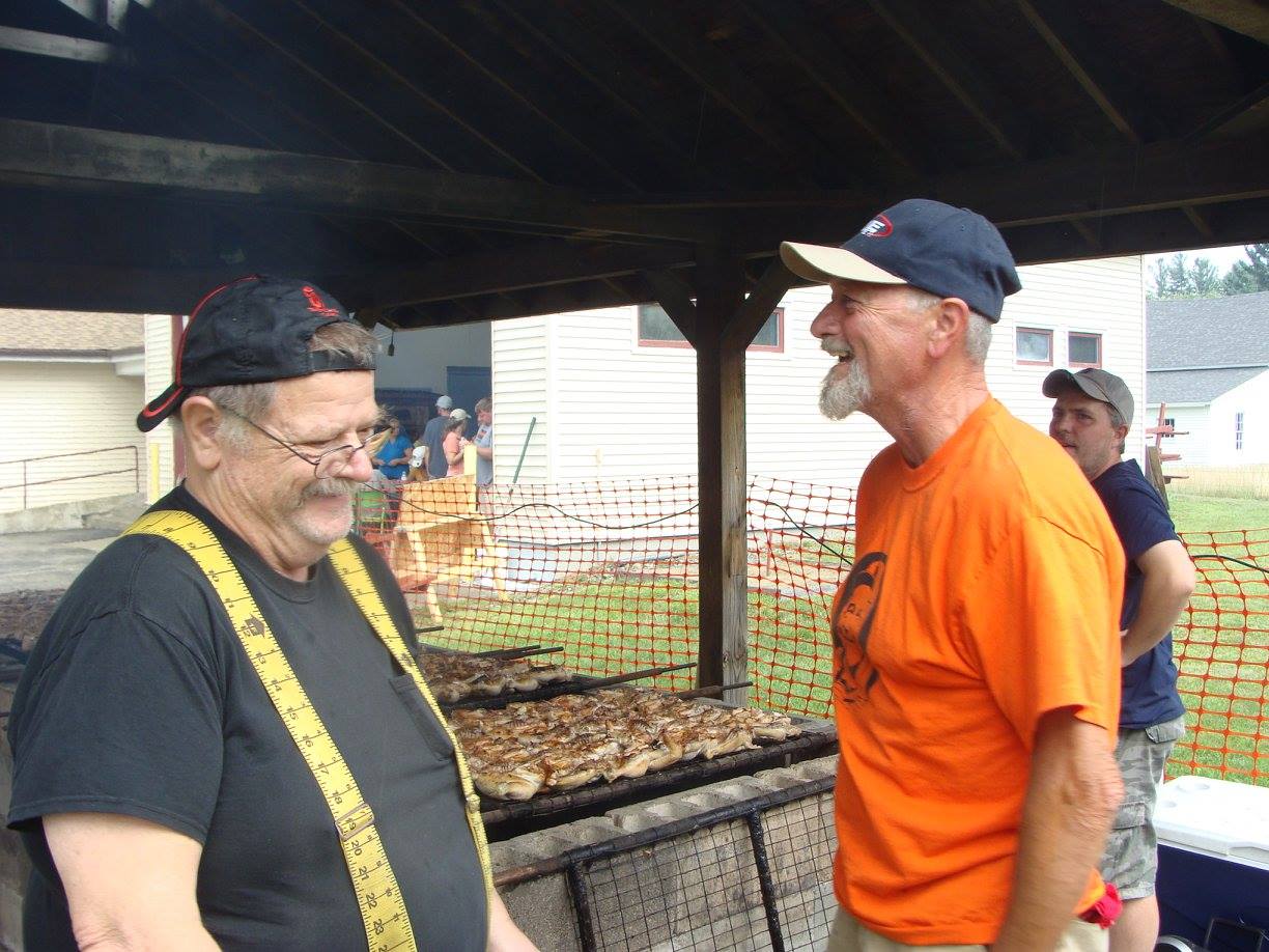Fire Department members enjoying the company of locals at the annual Field Day