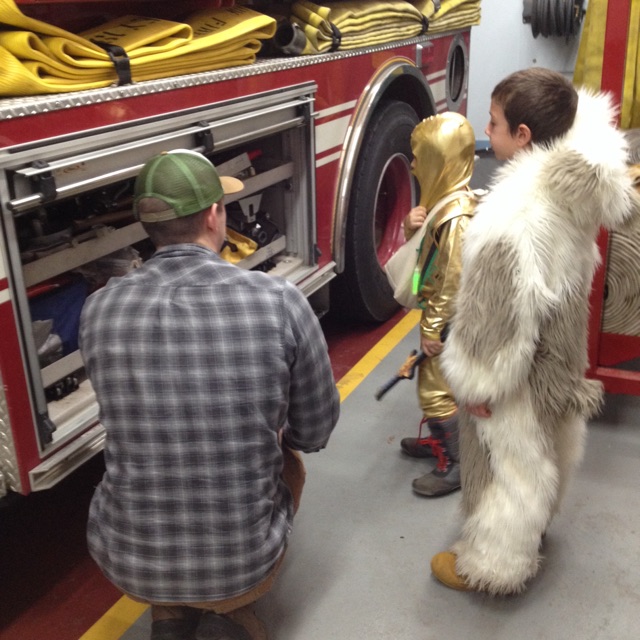 Curious Trick or Treaters  getting a tour of the Fire House during the KVFD Halloween Open House Safe Place