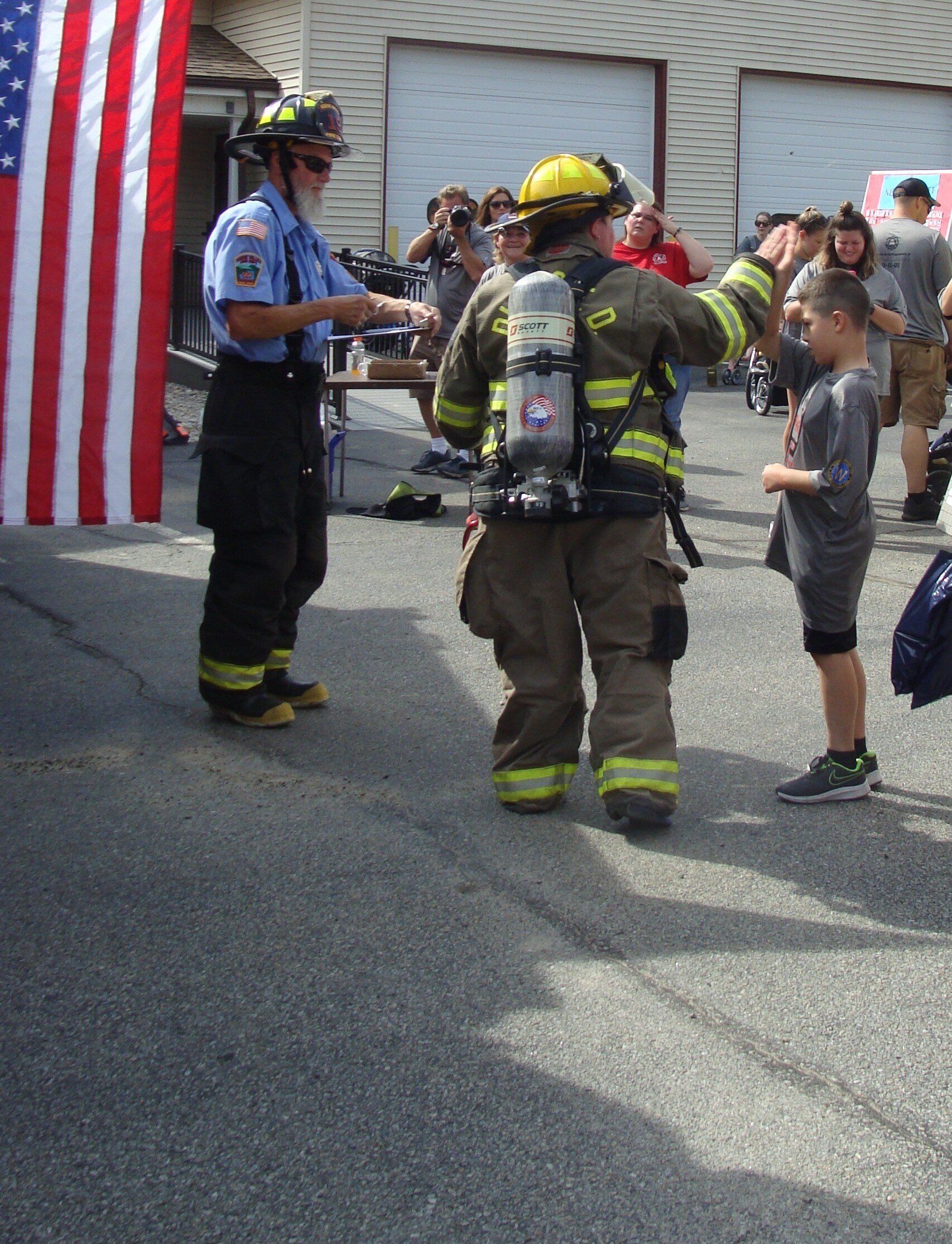 Local First Responder runners at the finish line for 9/11 Remembrance Run