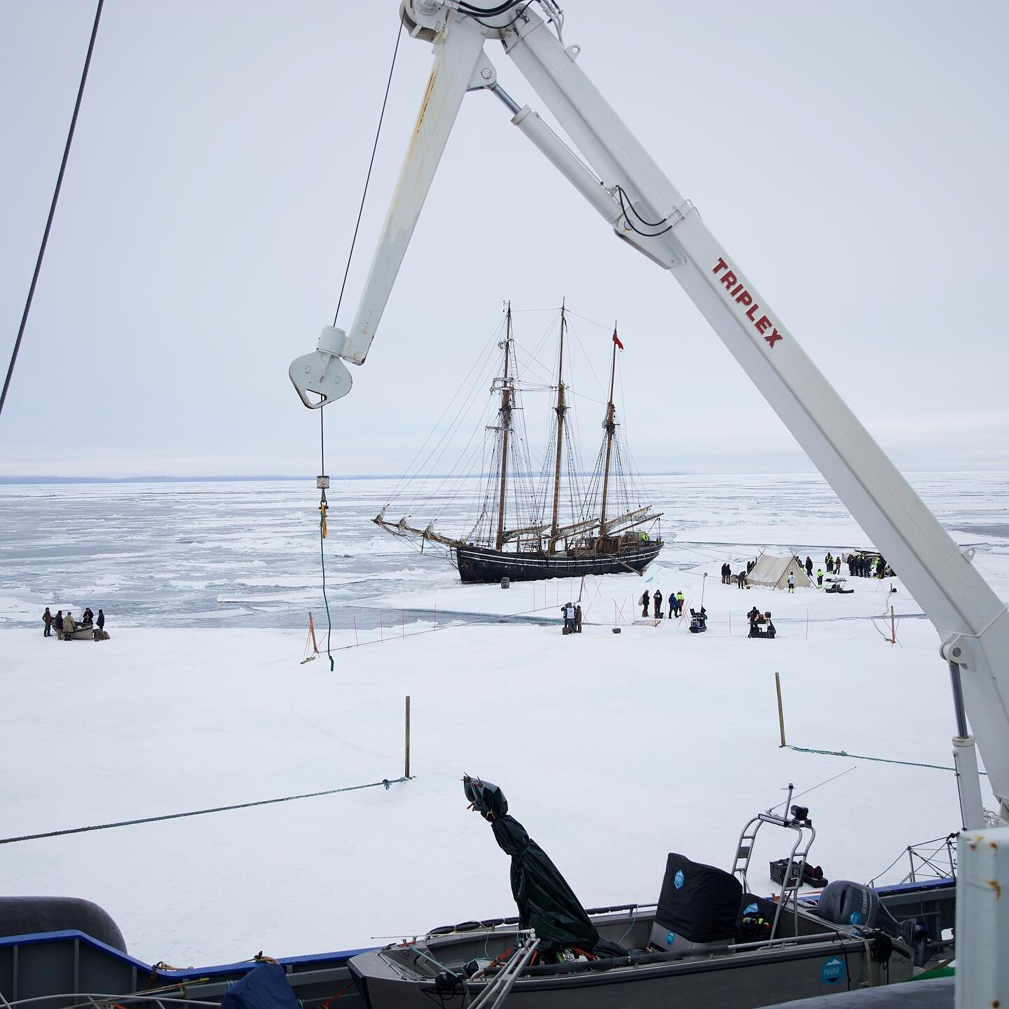 Props of every kind is lowered by crane from &ldquo;the beast/Lance&rdquo; to the ice and dragged to location. Work underway on the drama-film recorded farthest to the north in history. #Svalbard2019 #topgallantschooneractiv #Activ #topgallantschoone