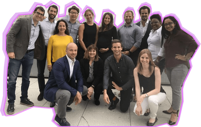 Edited photo of a corporate improv group with a pink border
