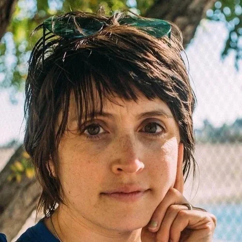 Professional headshot of Tallie Medel