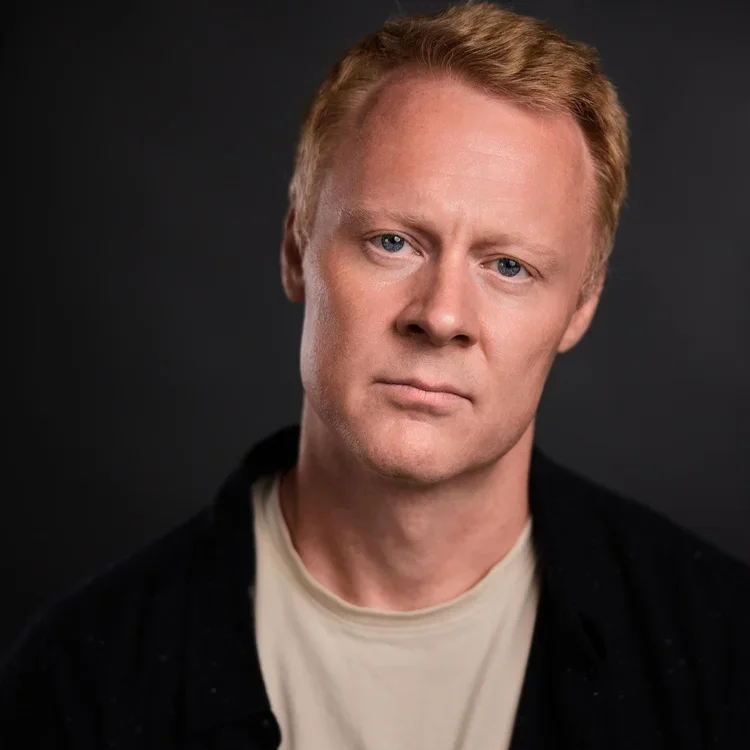 Professional headshot of Tim Martin