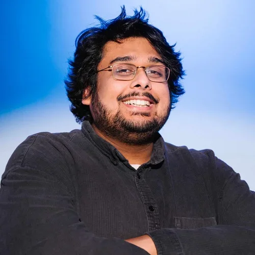 Professional headshot of Tej Khanna