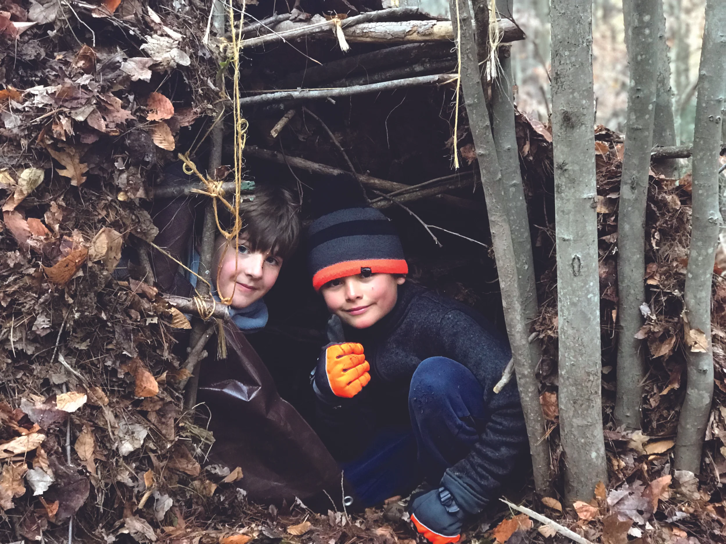 Fifth graders Robbie and Teo in their shelter