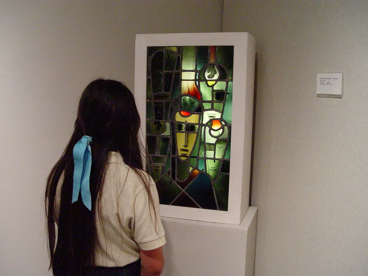 St. Ann's School tour 3-23-11 girl looks @ stained glass.jpg