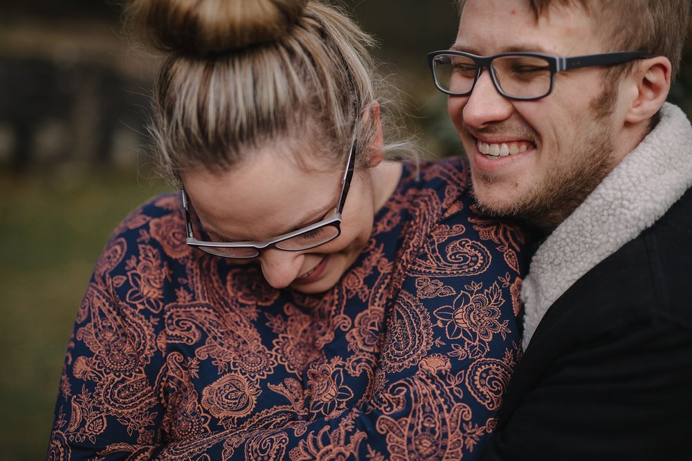 close up of man and woman laughing