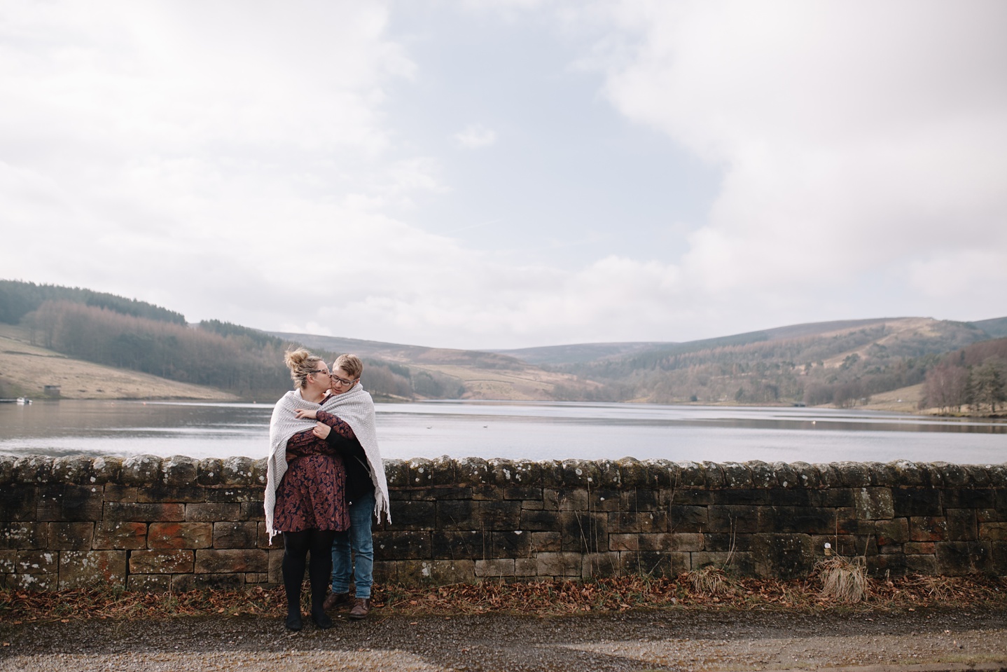 man and woman stood overlooking errwood reservoir