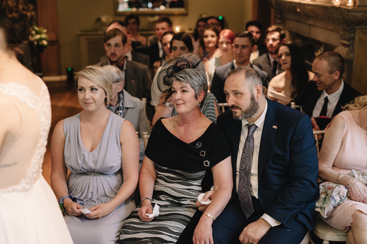 close up of proud mum and dad during the wedding ceremony