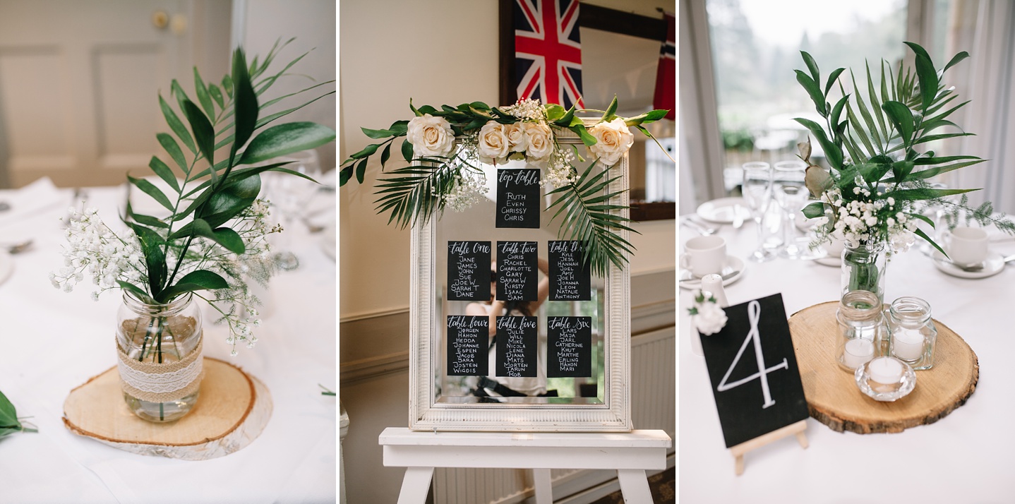 close up of fern table centre pieces and mirror table plan