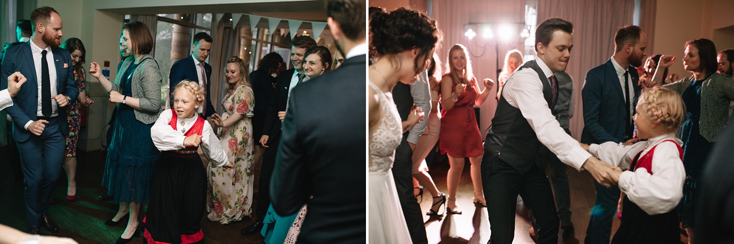 groom dancing with little girl