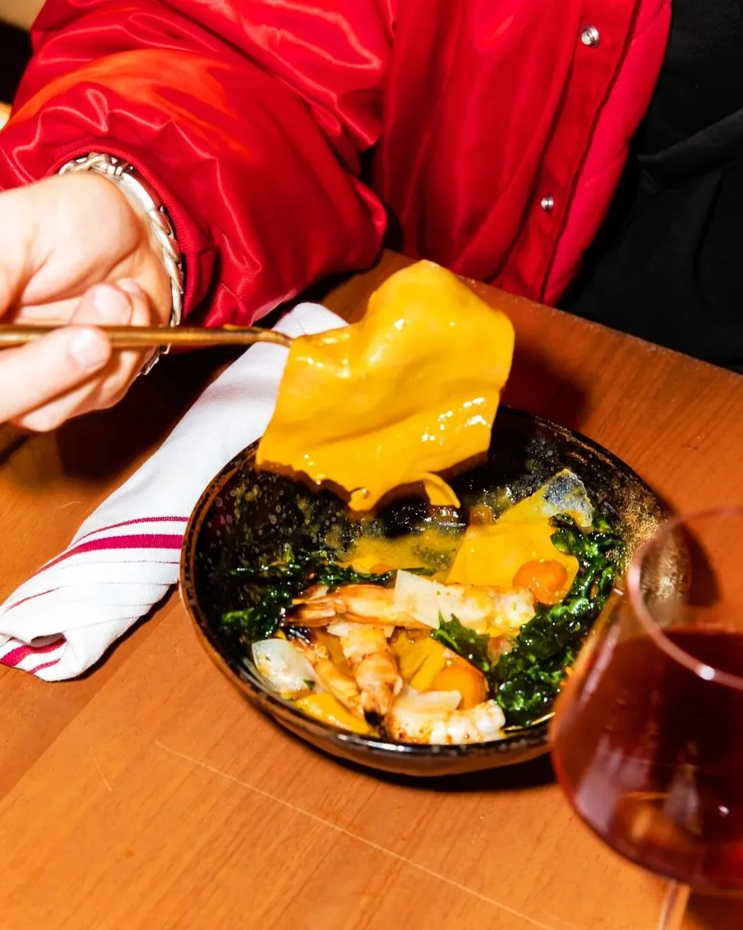 a very short day in the life of our new prawn lasagne - juicy ribbons of hand made pasta, coated in a creamy blistered sungold tomato sauce, make a short-lived foundation for tender new Caledonia prawns, whilst accents of persimmon, swarnadwipa spice