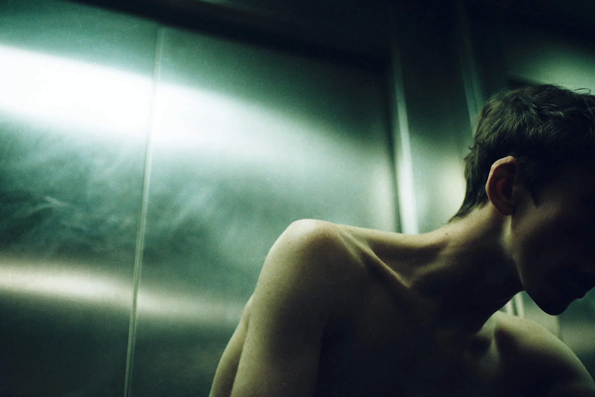 “Greenhalgh, convinced that men talking about their feelings isn’t encouraged enough in our society, addresses the issues of postmodern manhood by presenting his male subjects in a neon-coloured modulation or timbre that makes for a melancholic tension. The soft-toned glow in which they are captured contains echoes of recent Hollywood movies with introverted and anti- macho characters. The boys – or young men – are calm and self-contained. Shy, but not necessarily insecure; sensitive, but not automatically also weak.” - Erik Vroons, Editor-at-Large of GUP magazine "Tungsten seeks to break down the mask of masculinity and show the beauty and sensitivities that lie behind." - British Journal of Photography Tungsten can be purchased here