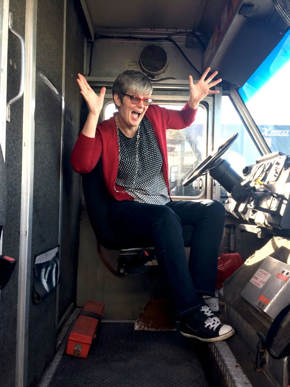Janis Thiessen aboard the newly purchased food truck. Photo by Sarah Story.
