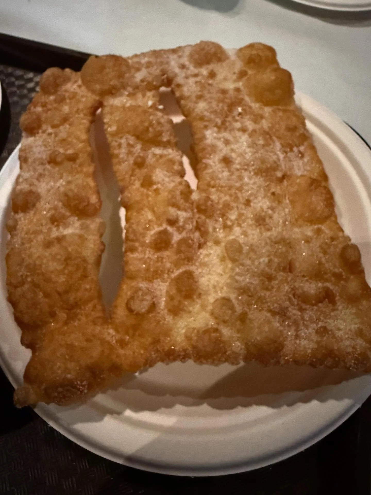 Coscor&otilde;es at @folklorama&rsquo;s #Portuguese pavilion. Delicious crispy deep fried dough! How many cultures have some variation of this? I grew up with rollkuchen, which we topped with salt (instead of sugar as these Coscor&otilde;es were) and