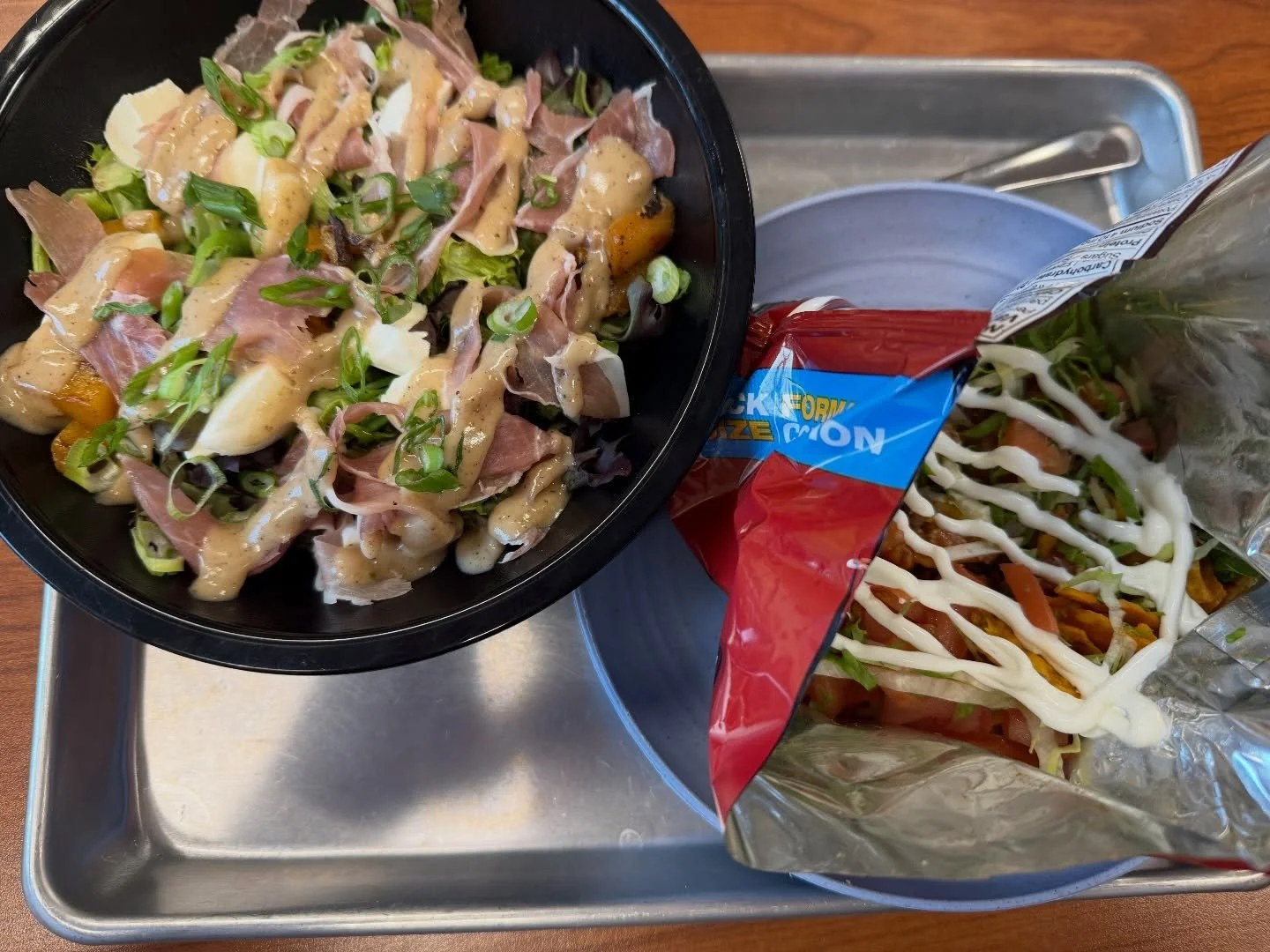 Eating both ends of the menu spectrum at @uwinnipeg @diversity_foods_services &mdash; grilled peach &amp; prosciutto salad, and taco in a bag. 😂 

One of the reasons we love Diversity (besides being our former research partners &mdash; love you #Foo