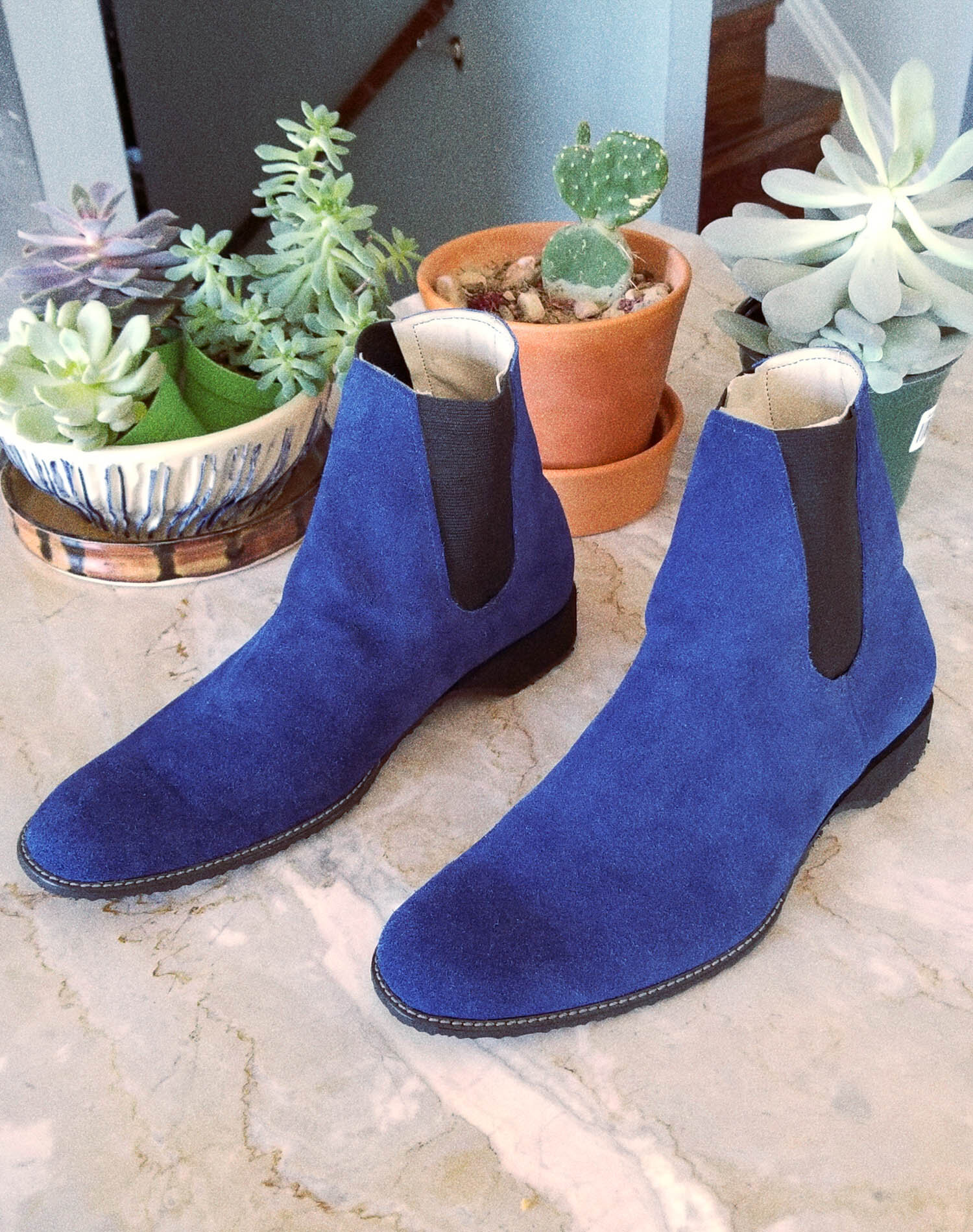 Blue suede chelsea boot.