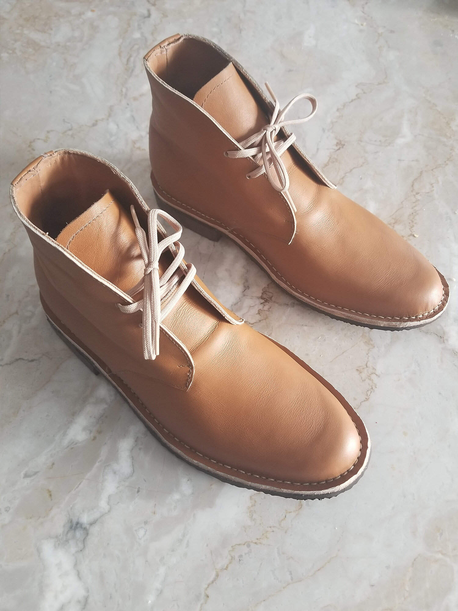 Tan leather chukka boot.