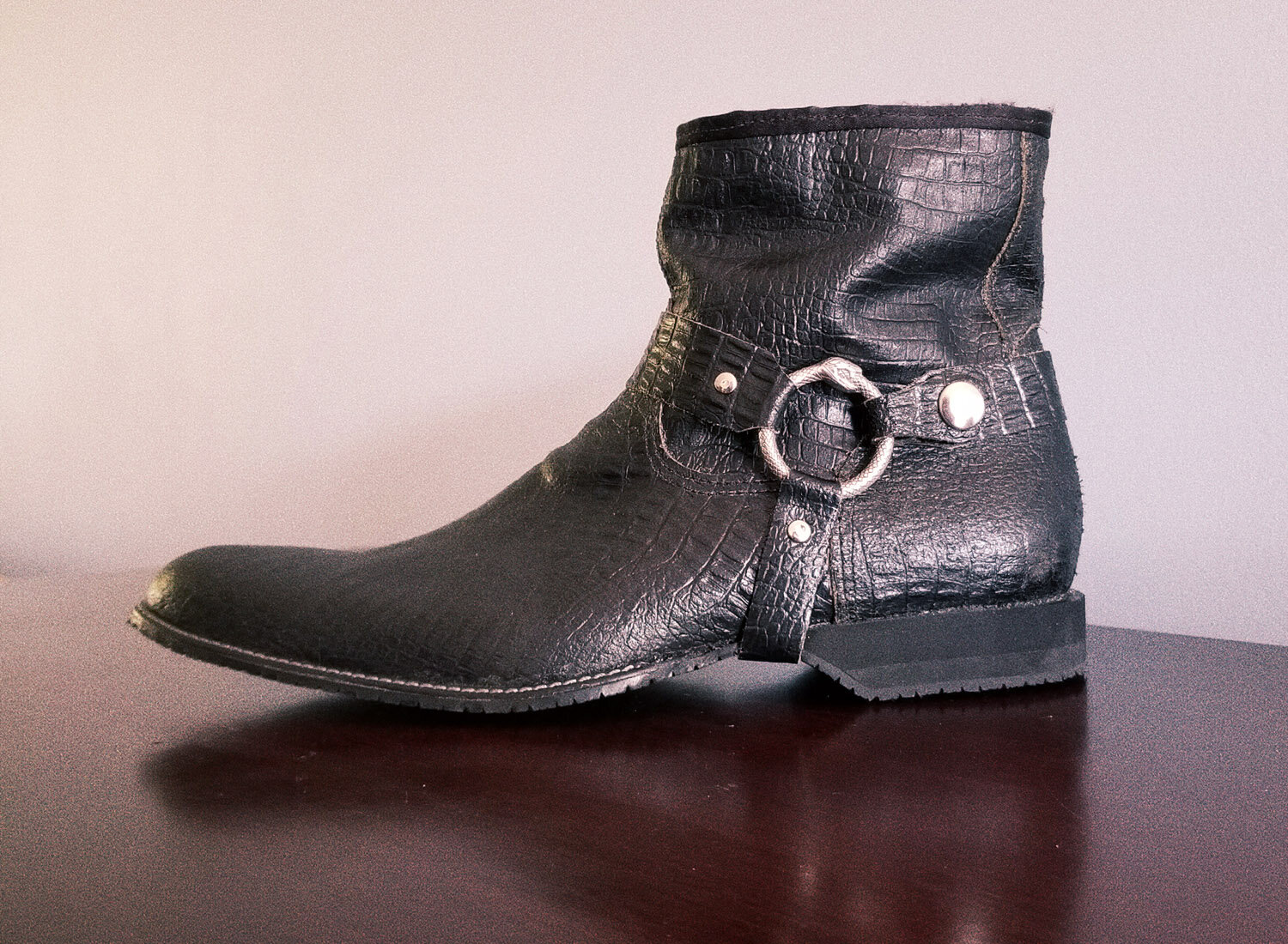 Alligator skin harness boot.