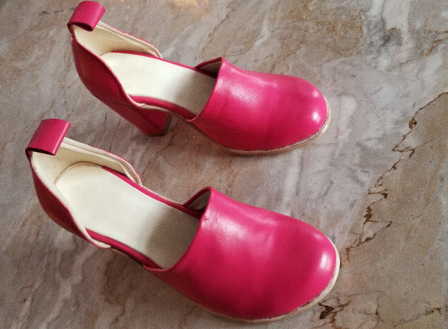 Raspberry pink leather heel.