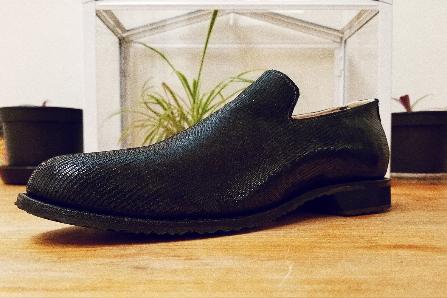 Fishscale leather slipper.