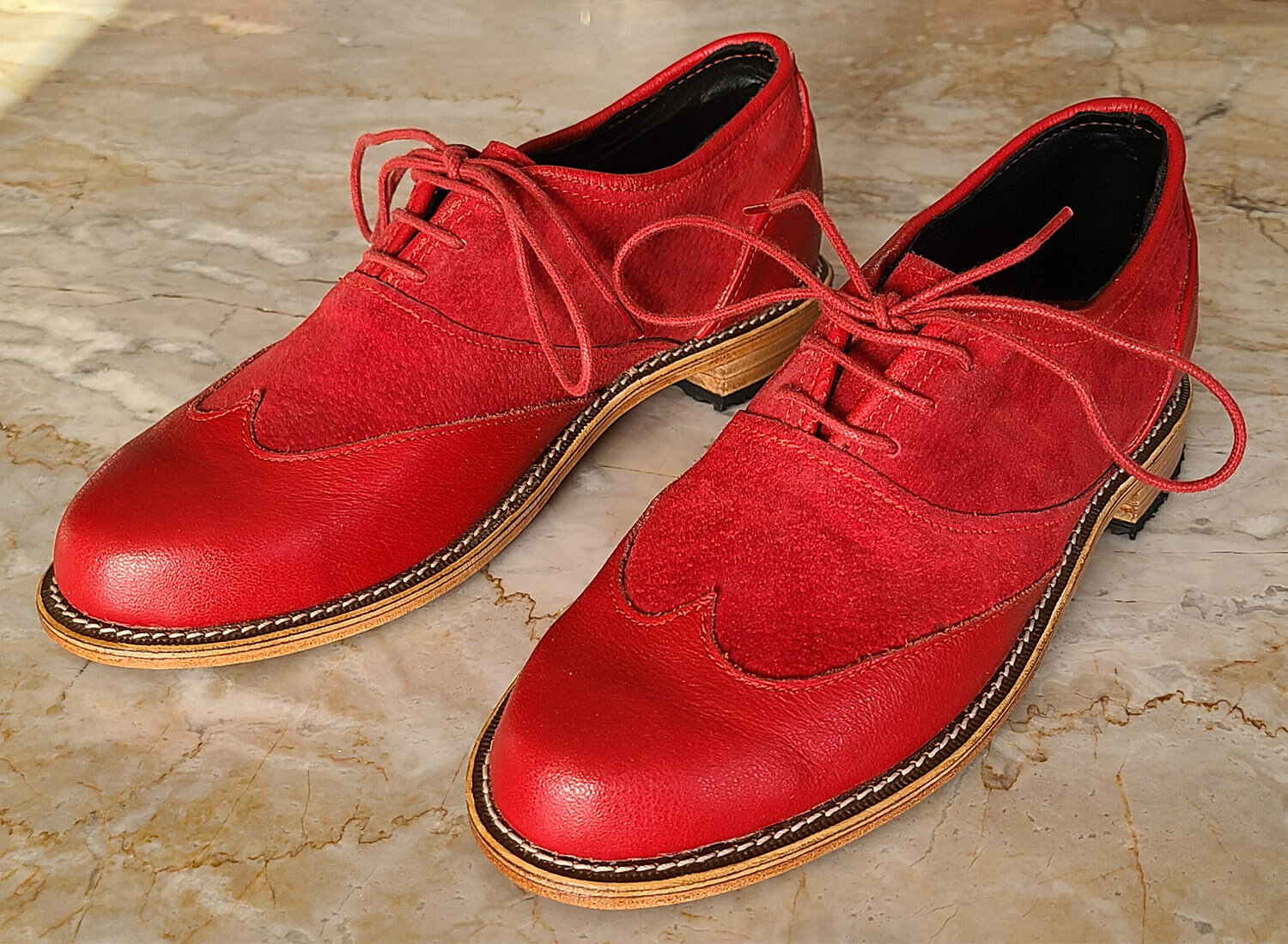 Red Oxford shoe.