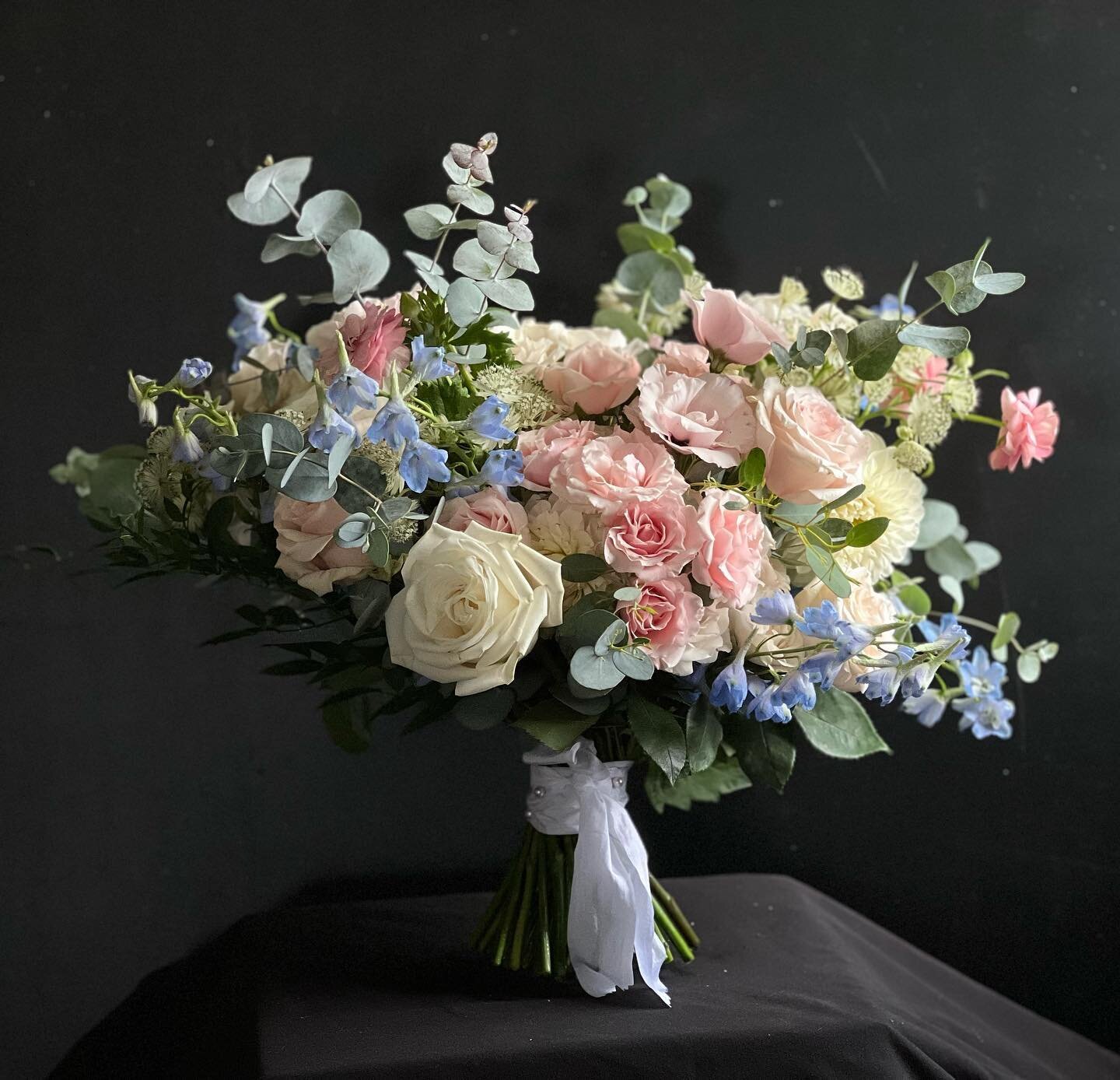 A dreamy bridal bouquet for Samantha - french blue delphinium just make everything better.  Local flowers and foliages in this bouquet are lisianthus, dahlias, eucalyptus, asters and a few of those aforementioned delph. We planted a whole bed of thes