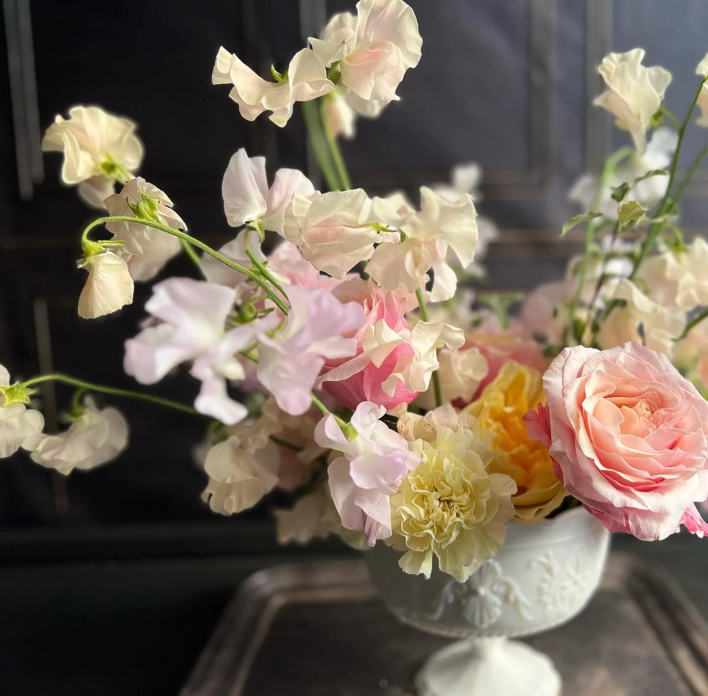 Sweet peas are always a good idea.  Always. 

#inthestudiotoday #sweetpeas #virginiagrown #locallygrownflowers #centerpiecegoals #weddingflowers #weddinginspiration