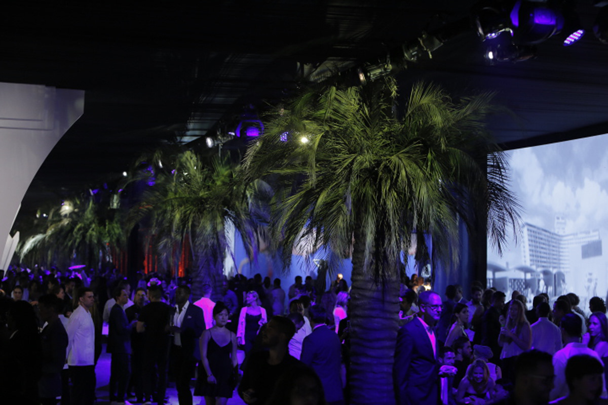 A view of the boardwalk at The Flamingo Party, a 33,000 square-foot immersive party by Hermès.