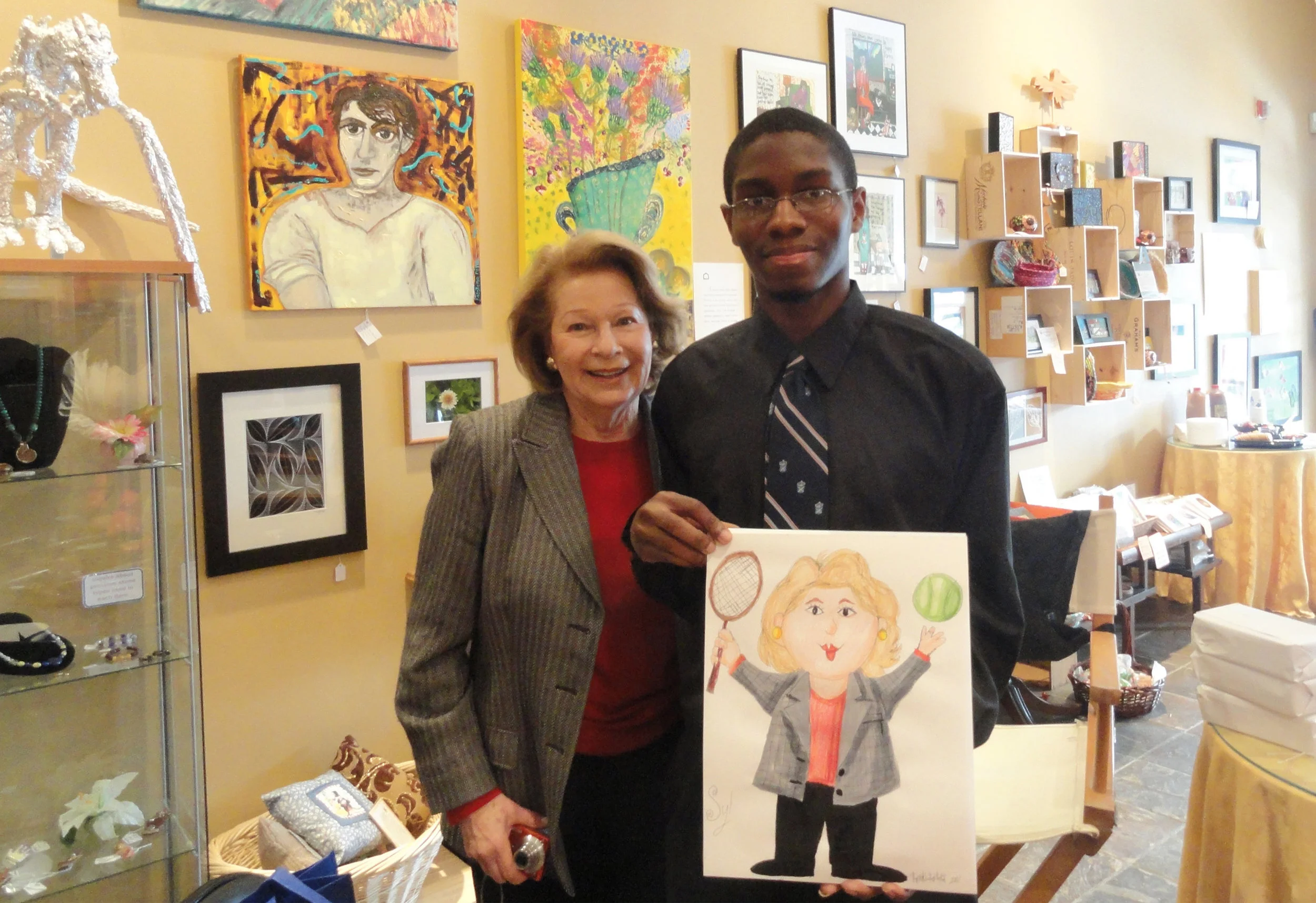  Artist Ronaldo Byrd creating caricatures in the AU pop-up gallery 