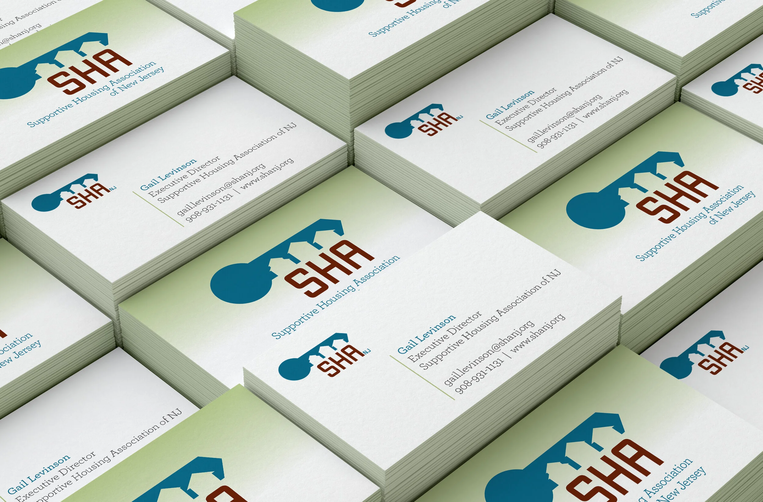  Business cards displaying SHA’s new brand elements. 