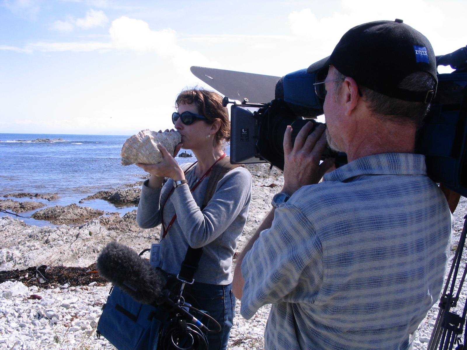Sigal tries out the conch shell 