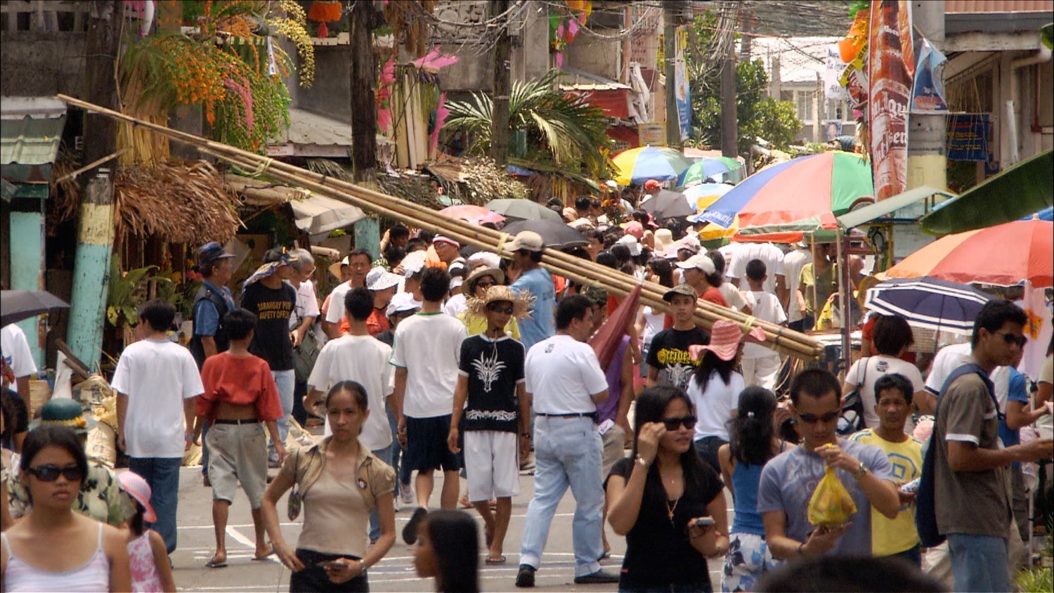 205_Philippines_carrying bamboo poles.jpg