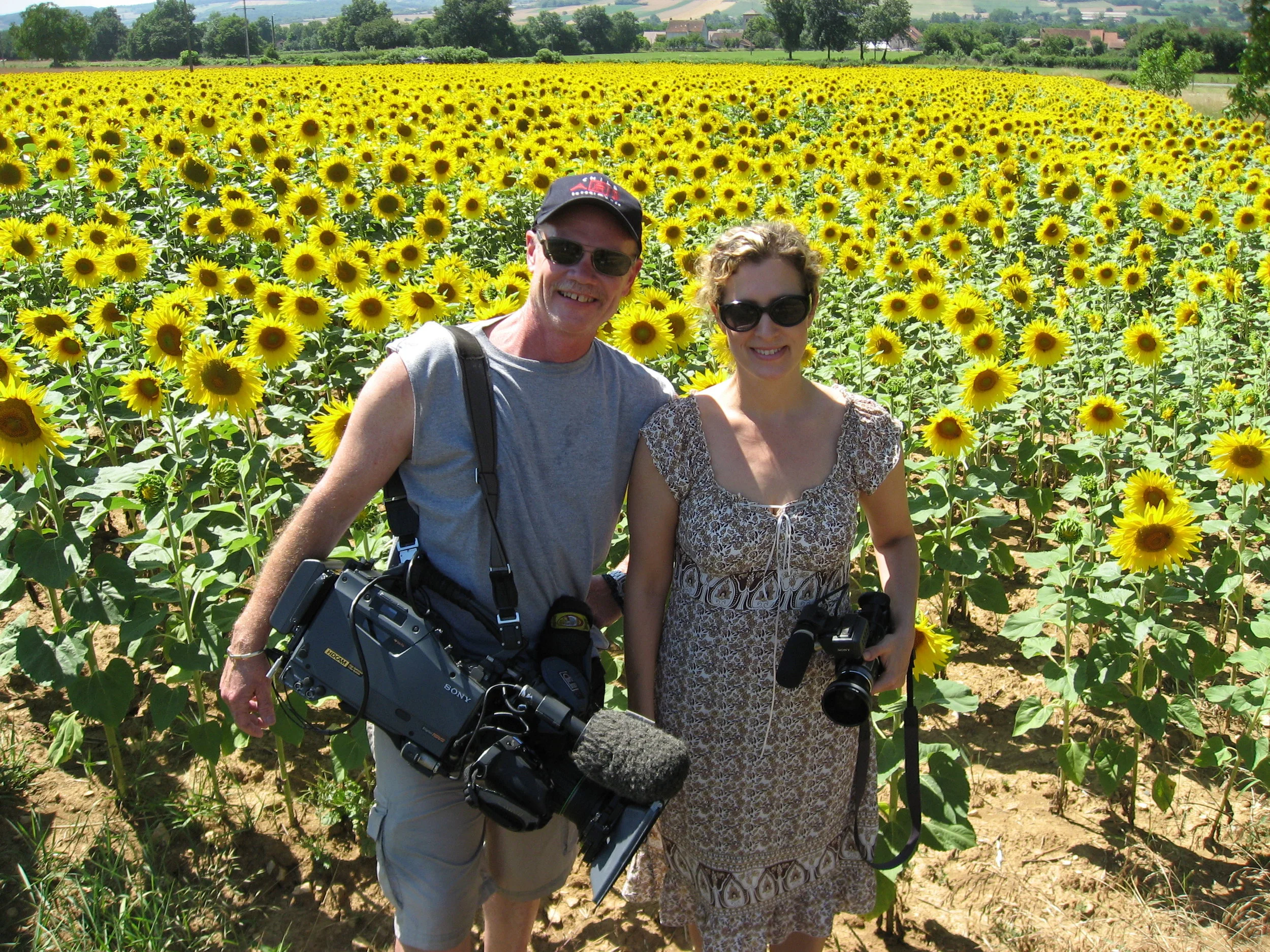 marc & sigal with sunflowers.JPG