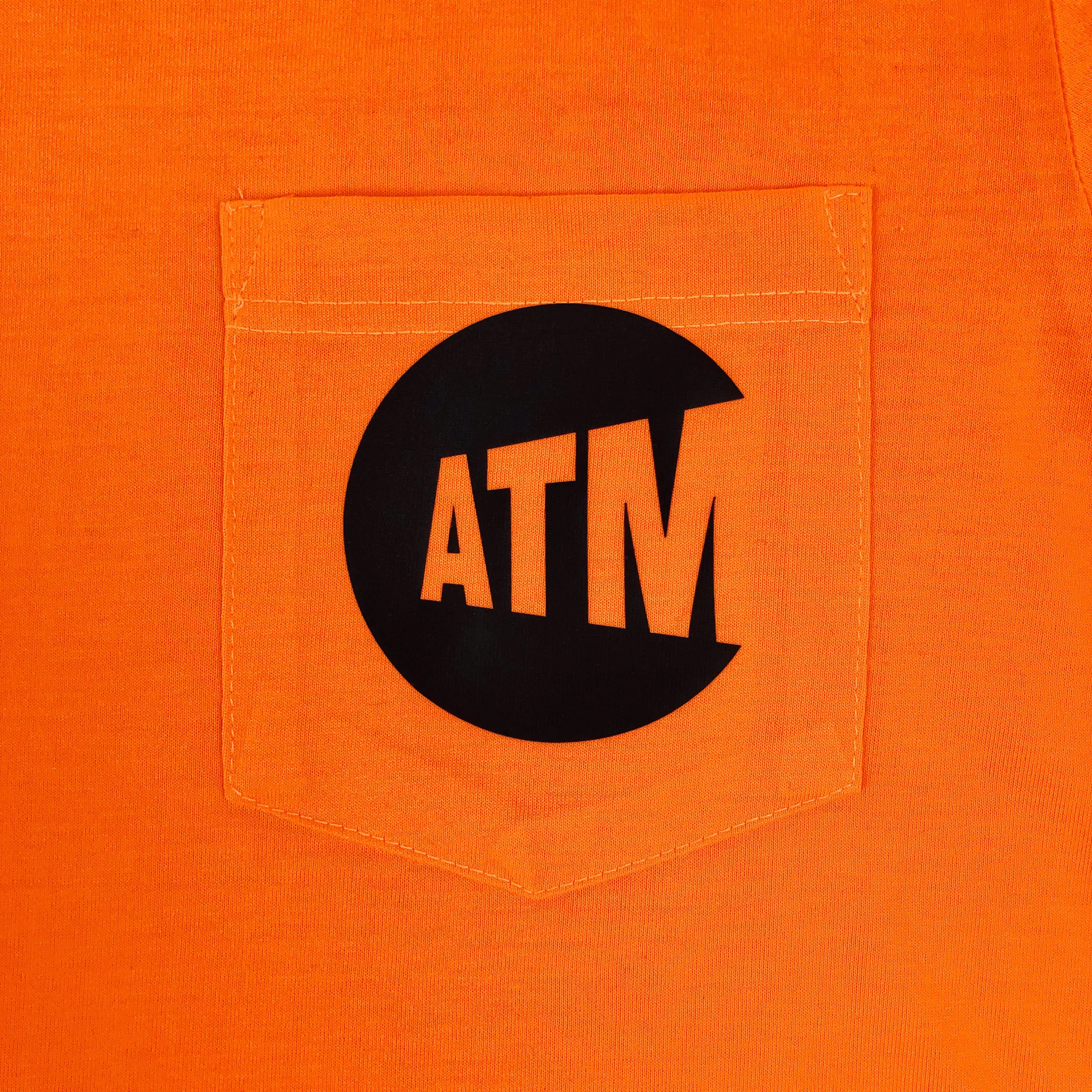 The MTA Reverse Logo Safety-Orange Transit Pocket Tee — An Honest 