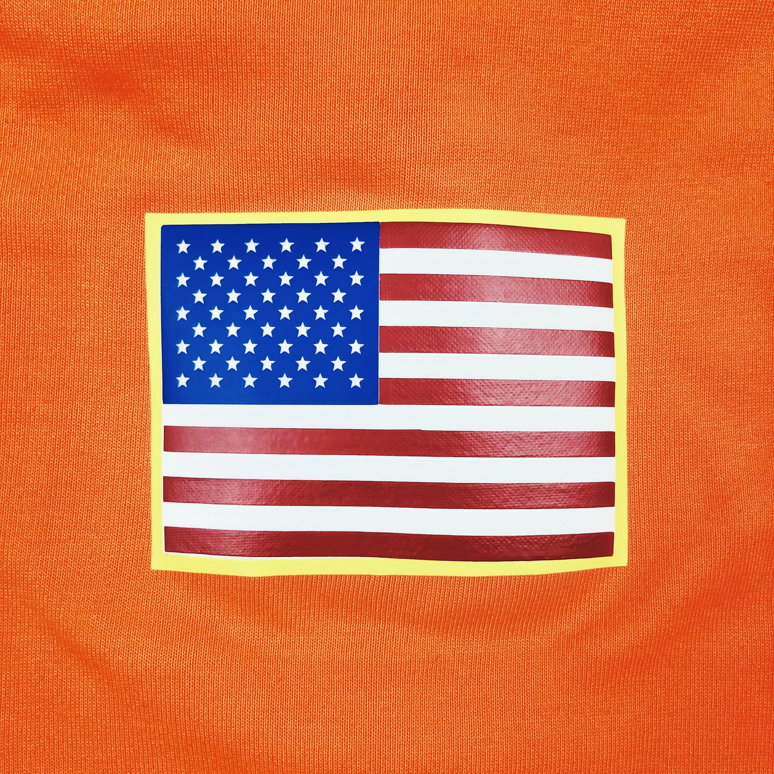 The MTA Reverse Logo Safety-Orange Transit Pocket Tee — An Honest 