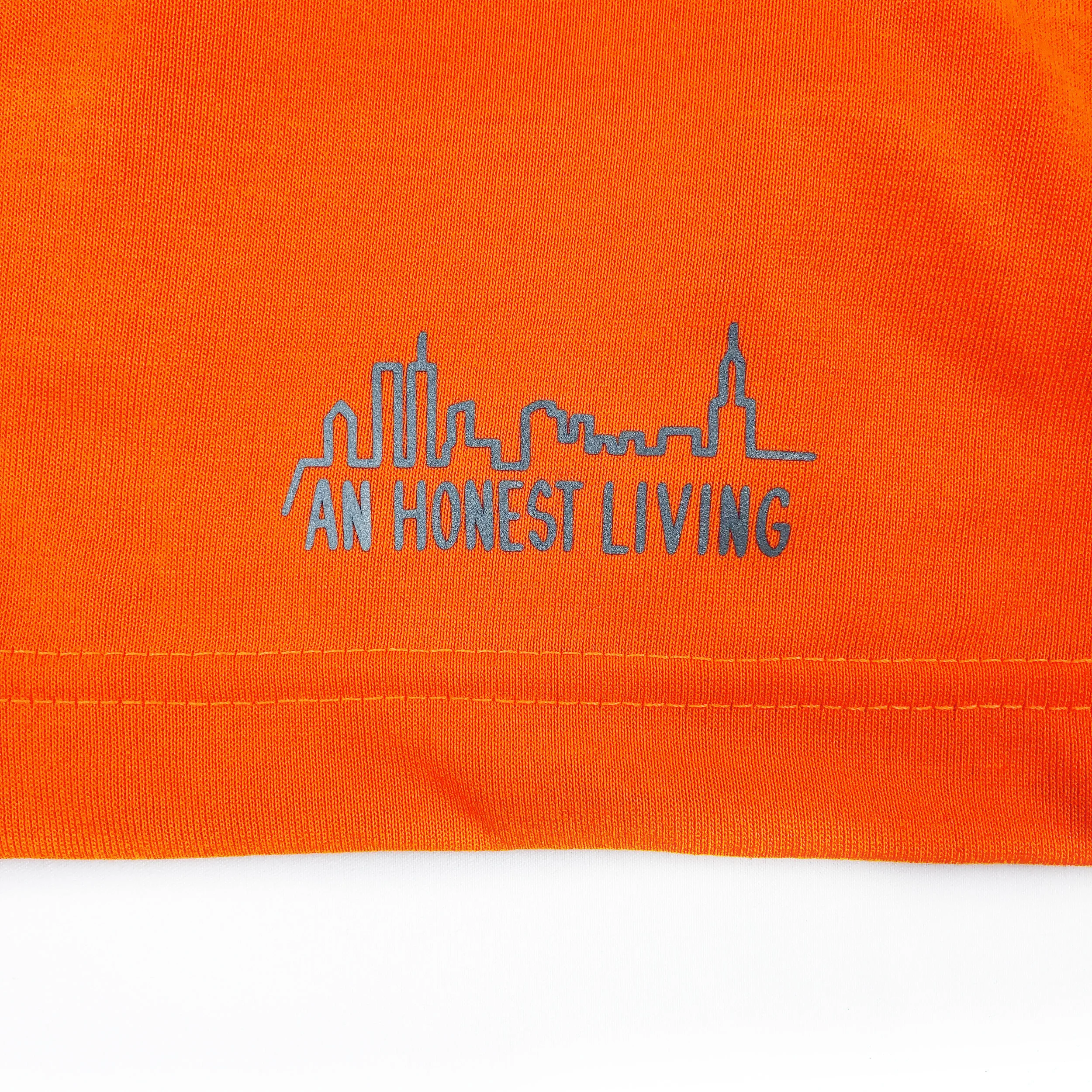 The MTA Reverse Logo Safety-Orange Transit Pocket Tee — An Honest 