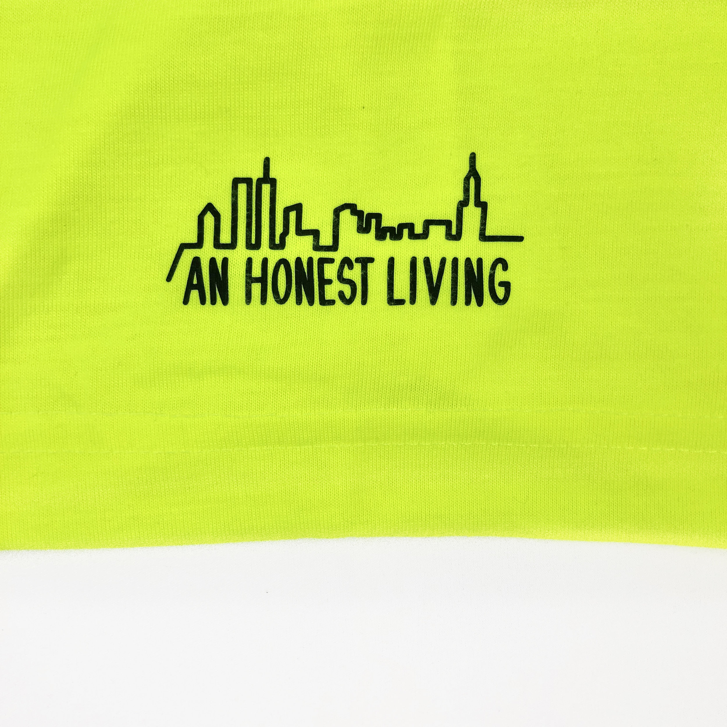 The conEd Reverse Logo Safety-Yellow Roadwork Pocket Tee — An 