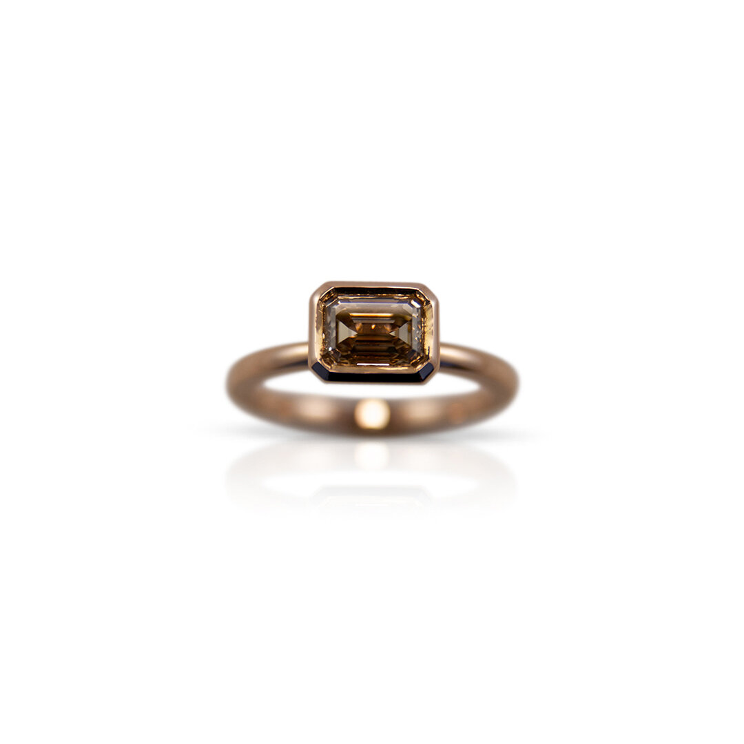 Minimalist Emerald Cut Ring