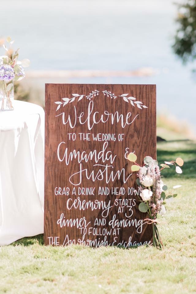 Wood welcome and timeline sign