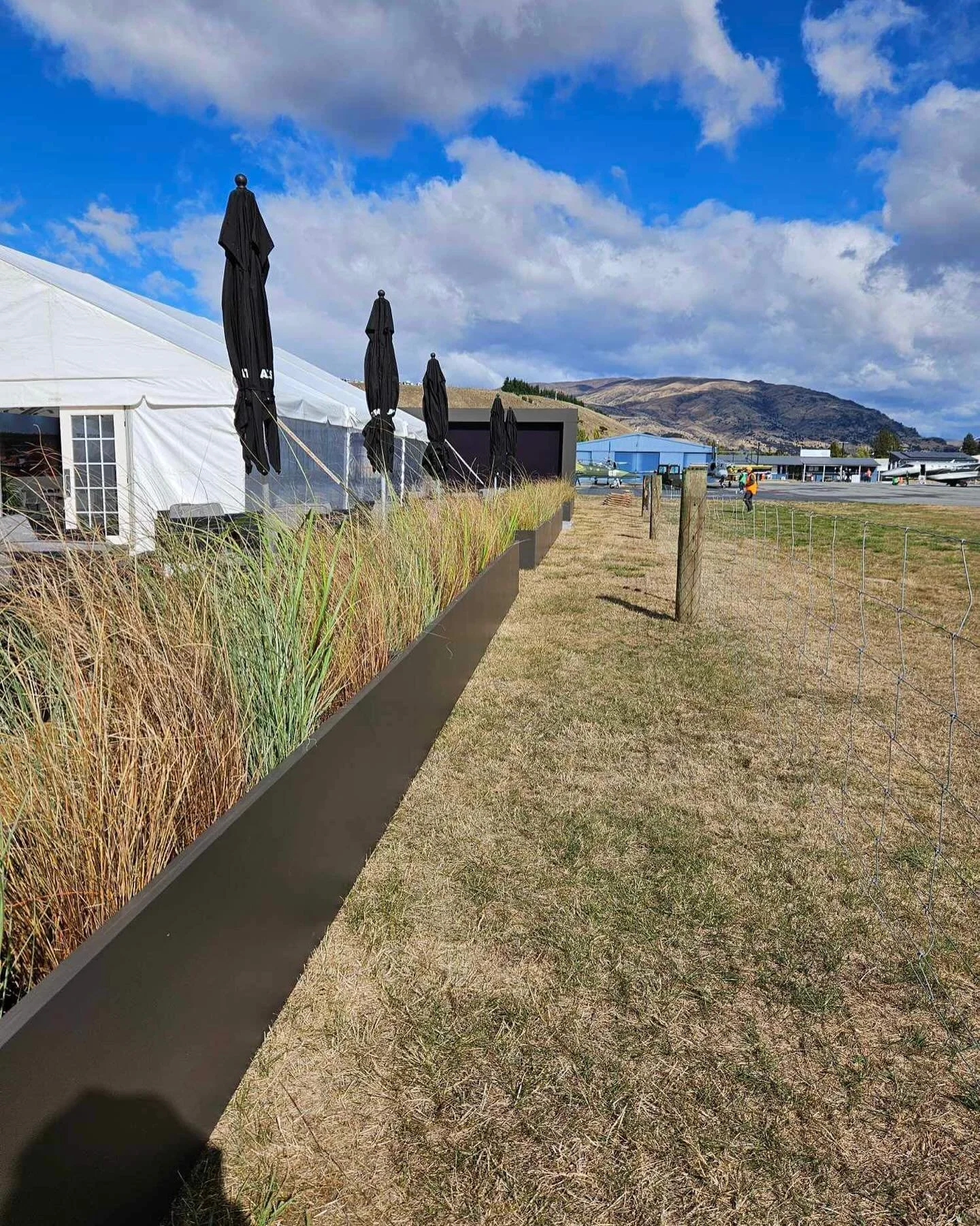 What a weekend @warbirdsoverwanaka 🚀 with 37 metres planted out from our local collection. Our grasses played a key roll here as we wanted to blend in with the Central Otago landscape.